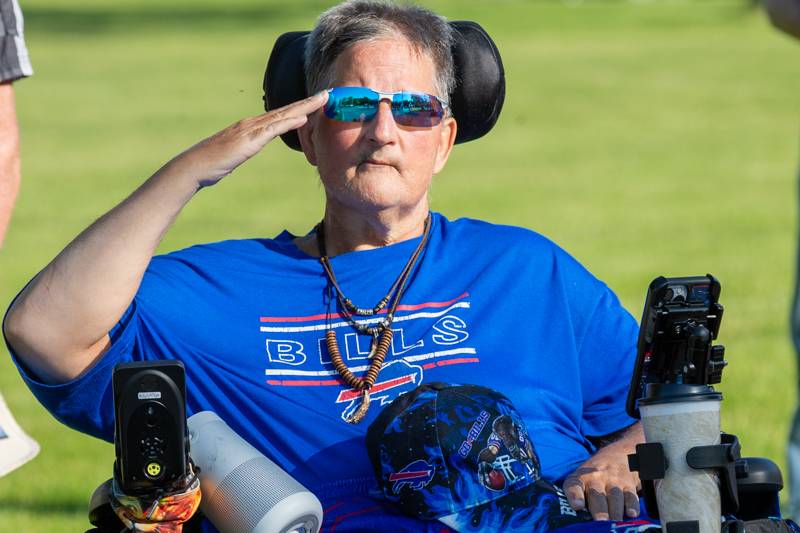 fellow veteran Buffalo Bills fan saluting the flag honoring vets