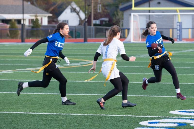 Ella Radley moving the ball up the field. Photo by Steve Ognibene